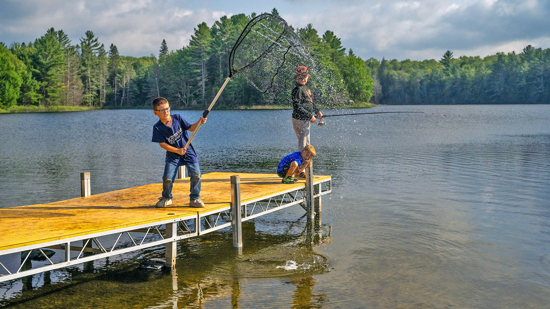 Boys on dock at Otter Lake